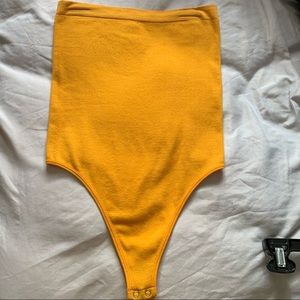 Yellow bodysuit